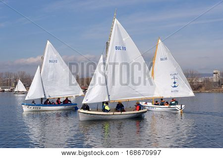 VARNA, BULGARIA - MARCH 03, 2014: Crew taking part in the national sailing boat race 