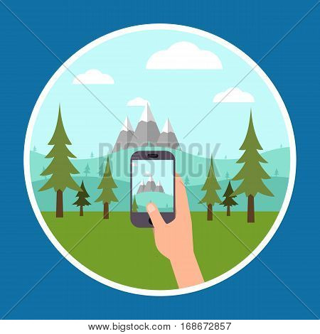 Close up on male hand taking photo of mountains with mobile cell phone. Summer outdoor vacation