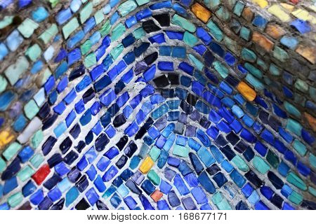 Colorful pattern of geometric mosaic old wall from smalt.