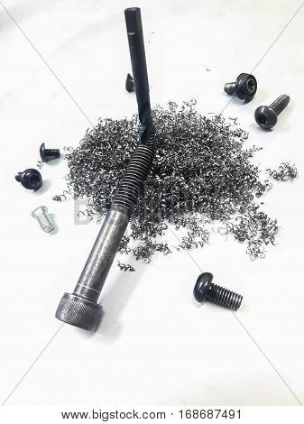 Industrial steel hardware bolt and nut on background