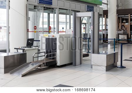 Airport security check point with metal detector and X ray scaner