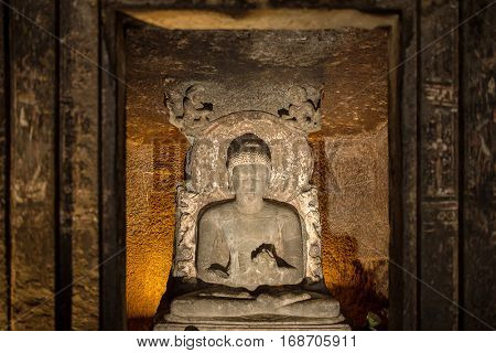 Aurangabad, India - March 3, 2016: Statue of Buddha on Ajanta caves near Aurangabad, Maharashtra state in India