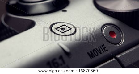 movie play button on the body of modern audio-video devices