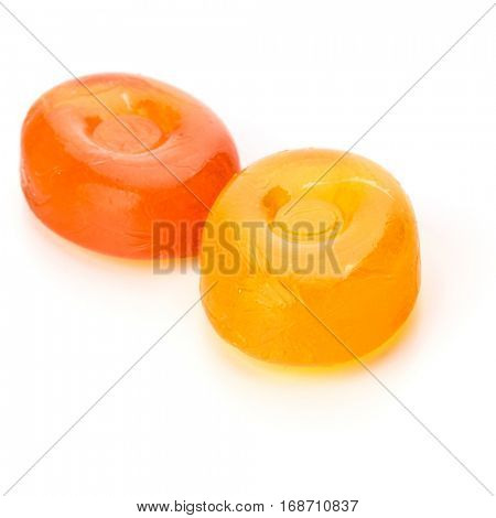 Two colorful fruit hard sugar candies,  boiled sweeties or sugar plums isolated on white background cutout.