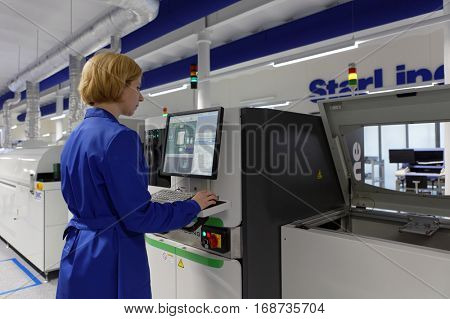 ST. PETERSBURG, RUSSIA - NOVEMBER 2, 2016: People at work on the production site of StarLine company. It is one of the leading company on the automotive security market of Russia