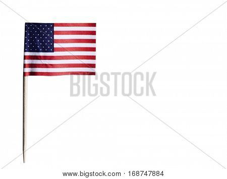 American flag in toothpick against white background