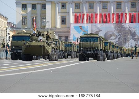 SAINT PETERSBURG, RUSSIA - MAY 05, 2015: Convoy of military equipment on Palace square. Rehearsal of parade in honor of Victory Day