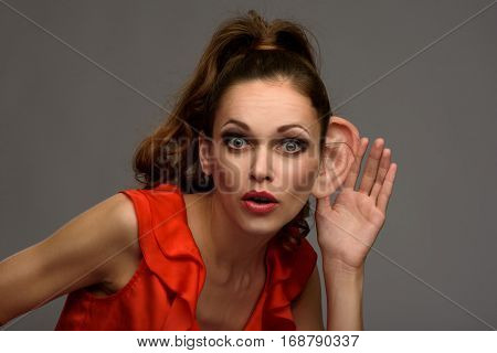 Shocked Young Woman Secretly Listening Conversation