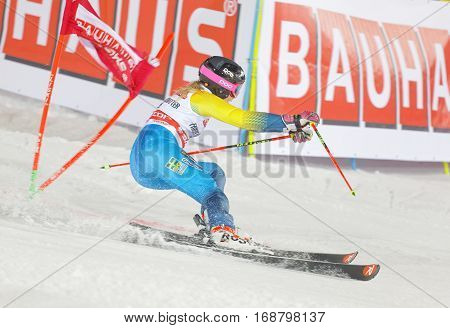 STOCKHOLM SWEDEN - JAN 31 2017: Side view of Frida Hansdotter (SWE) in the parallel slalom downhill skiing at the Alpine Audi FIS Ski World Cup - city event January 31 2017 Stockholm Sweden