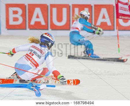 STOCKHOLM SWEDEN - JAN 31 2017: Side view of Melanie Meillard (SUI) and competiotor in the downhill skiing in the parallel slalom alpine event Audi FIS Ski World Cup. January 31 2017 Stockholm Sweden