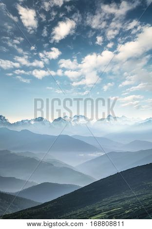 Hills during sunrise in mountain valley. Beautisul natural landscape