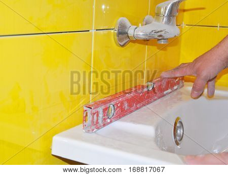 Close up on Bathtub Installation. How to Install a New Bathtub.