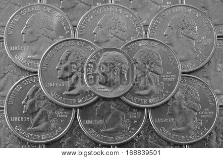 Coins of USA. Pile of the US quarter coins with George Washington