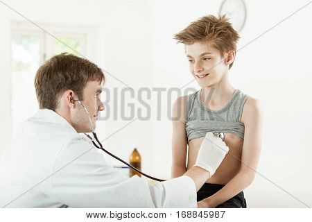 Doctor Listening Smiling Kid With Stethoscope