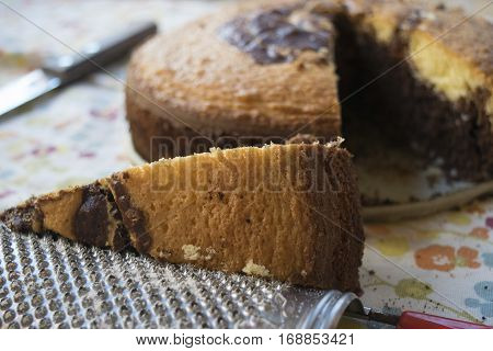 slices of genuine homemade sponge cake at the chocolate