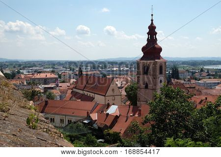 PTUJ, SLOVENIA - JULY 02: Roofs of old city center and Saint George church in Ptuj, town on the Drava River banks, Lower Styria Region, Slovenia on July 02, 2016.