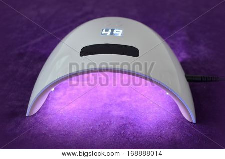 Nail gel salon. Lamp UV  for nails UV with timer