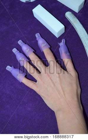 Pins for removing gel nail polish on fingers