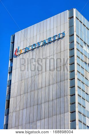 Basel, Switzerland - 27 August, 2016: partial view of one of Novartis buildings, as seen from Dreirosenbruecke bridge. Novartis International AG is a Swiss pharmaceutical company, based in the city of Basel, Switzerland.