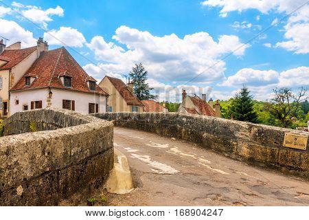 Bridge in picturesque medieval town of Semur en Auxois Burgundy France