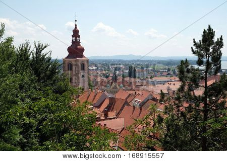 PTUJ, SLOVENIA - JULY 02: Roofs of old city center and Saint George church in Ptuj, town on the Drava River banks, Lower Styria Region, Slovenia on July 02, 2016.