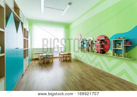 Soft Green Game Room in the Kindergarten. Natural Light.