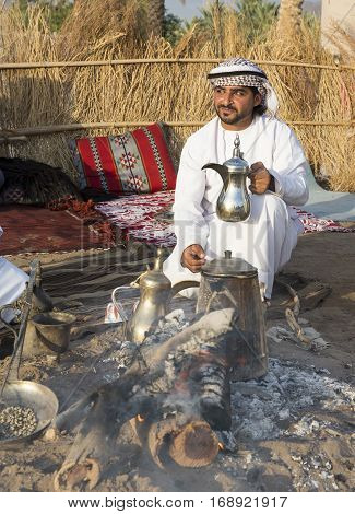Muscat Oman February 4th 2017: omani man with a traditional coffee pot
