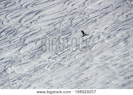 Snowboarder having fun skiing offside on the snowy mountain of the Hintertuxer Glacier (Tuxer Ferner) in Tyol Austria