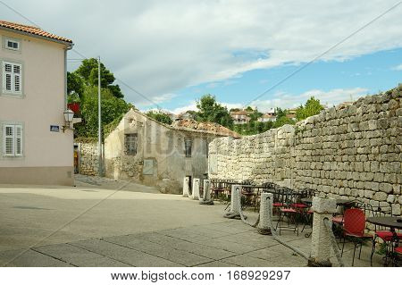Krk Croatia: a town in the south of the island of Krk. It is a tourist resort in old town there are preserved fragments of buildings from Roman times. Defensive walls of the Frankopanski Castle and old building.