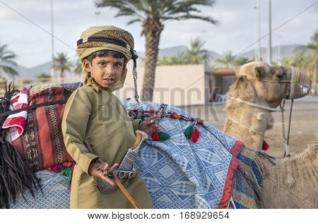 Muscat Oman February 4th 2017: young omani boy in traditional clothing
