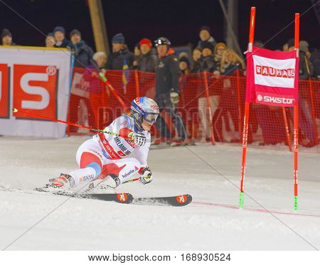 STOCKHOLM SWEDEN - JAN 31 2017: Rear view of Melanie Meillard (SUI) in the downhill skiing in the parallel slalom alpine event Audi FIS Ski World Cup. January 31 2017 Stockholm Sweden