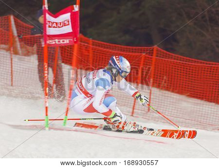 STOCKHOLM SWEDEN - JAN 31 2017: Rear view of Melanie Meillard (SUI) in the downhill skiing in the parallel slalom alpine event Audi FIS Ski World Cup. January 31 2017 Stockholm Sweden