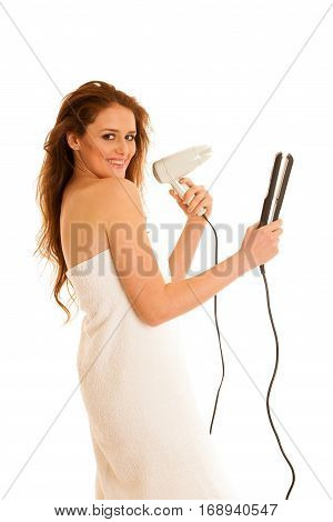 Beautiful Young Woman Holds Hair Brush And Blow Dryer Isolated Over White Bavkground