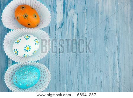 Easter eggs background with copyspace top view