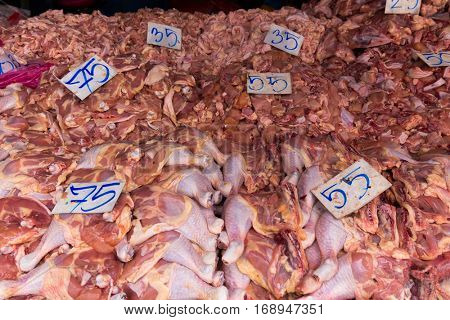 Raw chicken meat and offal in asian market