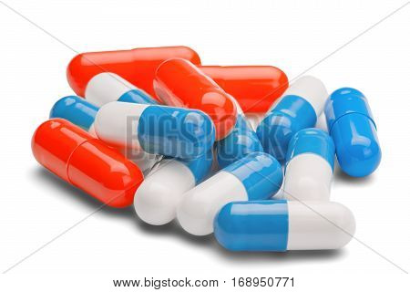 Medicine Red And Blue Pills On A Isolated White Background