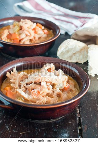 typical Italian dish tripe with beans potatoes and veal