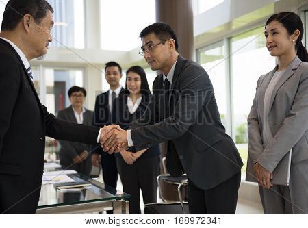 Business Partners Introductionary Handshake Bow