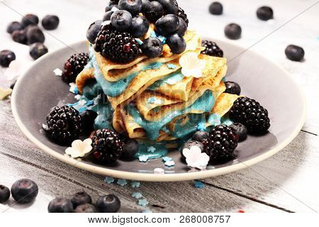 Delicious Tasty Homemade Crepes Or Pancakes With Blackberries,blueberries And Blue Spirulina Nicecre