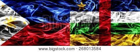 Philippines Vs Central African Republic Smoke Flags Placed Side By Side. Thick Abstract Colored Silk