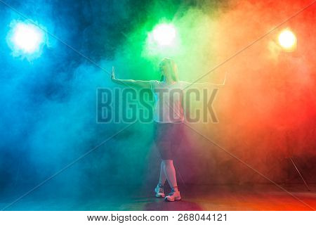 Hip-hop, Jazz-funk, Tecktonik, Waacking, Trance And Street Dances Concept - Young Woman Dancing Jazz