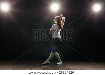 Hip-hop, Jazz-funk, Tecktonik, Waacking, Trance And Street Dances Concept - Young Woman Dancing Jazz