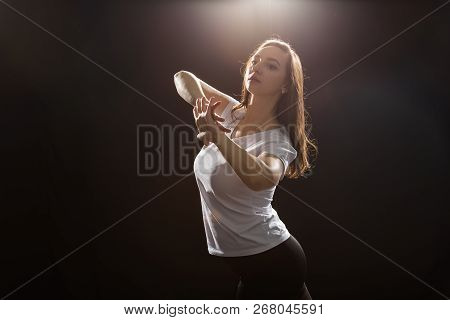 Hip-hop, Jazz-funk, Tecktonik, Waacking, Trance And Street Dances Concept - Young Woman Dancing Jazz