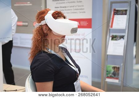 Vienna, Austria - September, 2018: Woman In Black In Vr Equipmen