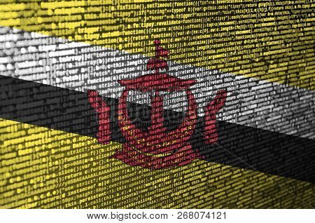 Brunei Darussalam Flag  Is Depicted On The Screen With The Program Code. The Concept Of Modern Techn