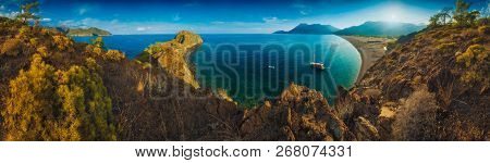 Panoramic View Of Cirali Beach And Olimpos Mountain In A Sunset Light. Kemer, Antalya, Mediterranean