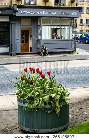 Todmorden , England - May 04 2018 : The Funeral Service Is Working From The Centre Of Todmorden Whic