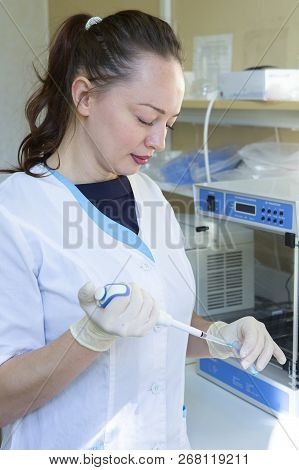 Young Scientist Works In Modern Biological Lab