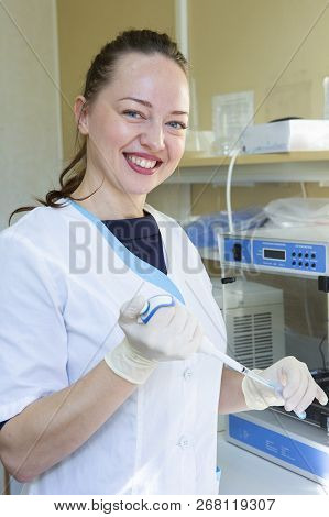 Scientist Working At The Laboratory