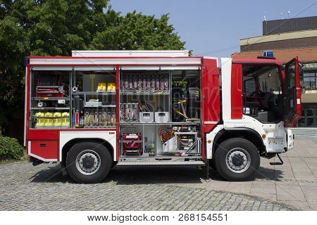 Red Fire Truck With Open Door And All His Equpment On Hot Summer Day|cakovec
